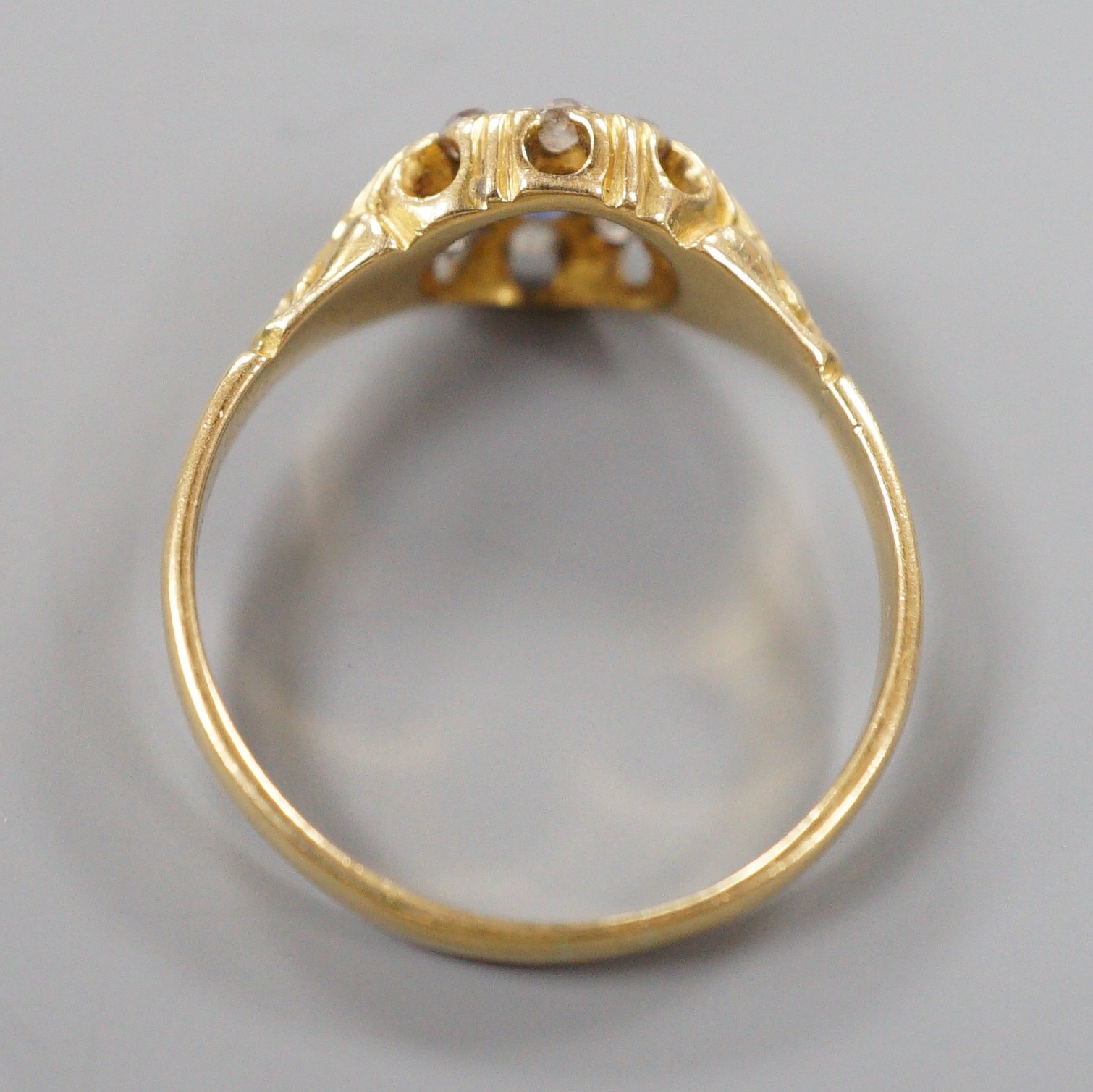 An early 20th century yellow metal, sapphire and diamond set cluster ring (stone missing), size P/Q, gross weight 3.5 grams.